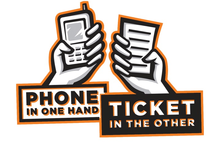 Phone in one hand, Ticket in the other.